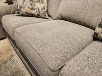 La-Z-Boy 494 Collins Stationary Sofa close-up with a floral pillow on gray fabric, made in America.