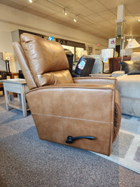 The La-z-boy 759 Maddox Rocker Recliner blends style and comfort with a contemporary flair, making a striking display in any store showroom. This brown leather recliner invites you to experience luxury while elevating the aesthetic of any room.