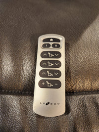 La-Z-Boy's 521 James Power Rocker Recliner features a remote on leather with adjustable PowerReclineXR buttons.