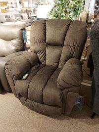 The showroom features Best's 6M52 Kona Power Lift Chair, a large plush recliner offering comfort and durability.