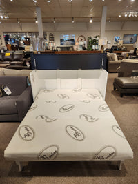 In a store display, featuring a Cabinet Bed Inc "Barn Black Elite Series" queen-size bed with gel-infused mattress.