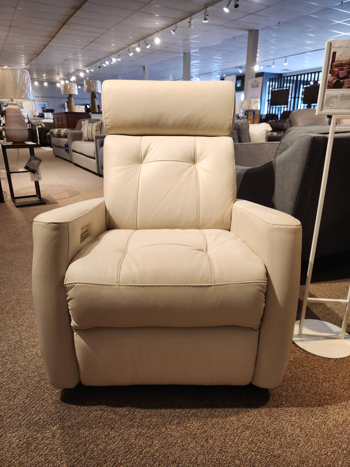 Beige leather 42204 West Coast Power Swivel Glider by Palliser offers comfort and contemporary style in the showroom.