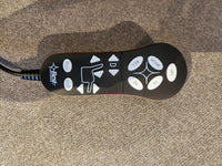 Black remote with arrow and recline buttons, from the Best Davida 2AZ53 Power Lift Chair.