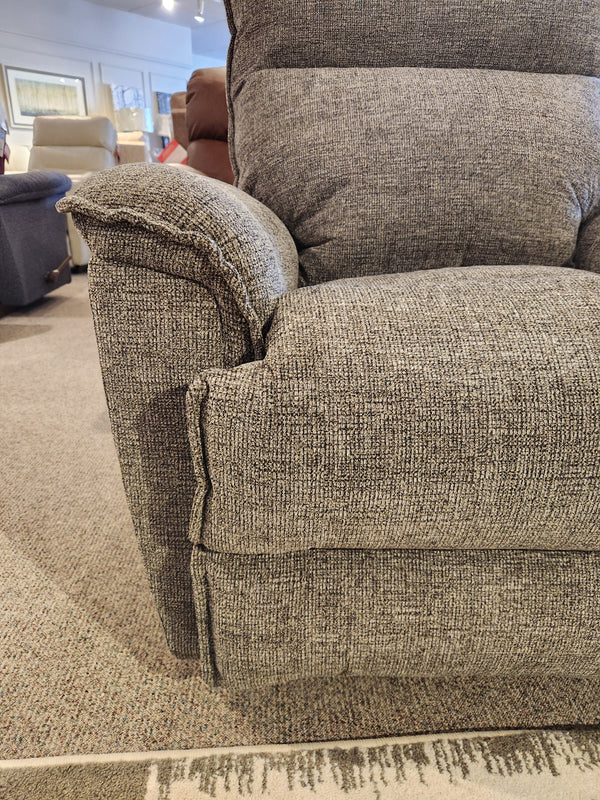 The La-z-boy 706 Jay Power Rocker Recliner features a casual style with gray upholstery and padded armrests.