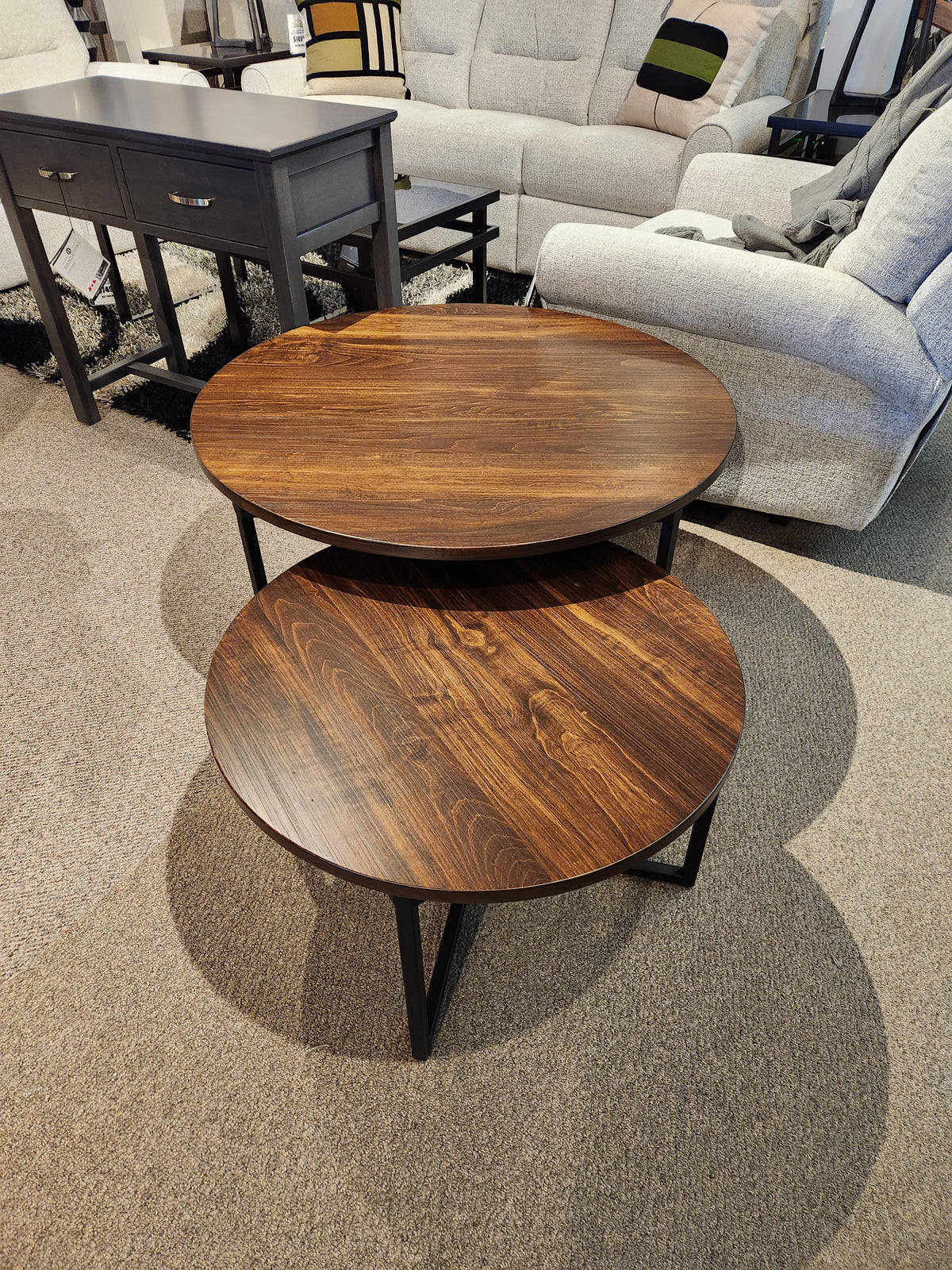 Two Handstone Alacarte Bedford coffee tables with wood tops and metal frames arranged on a carpeted floor.