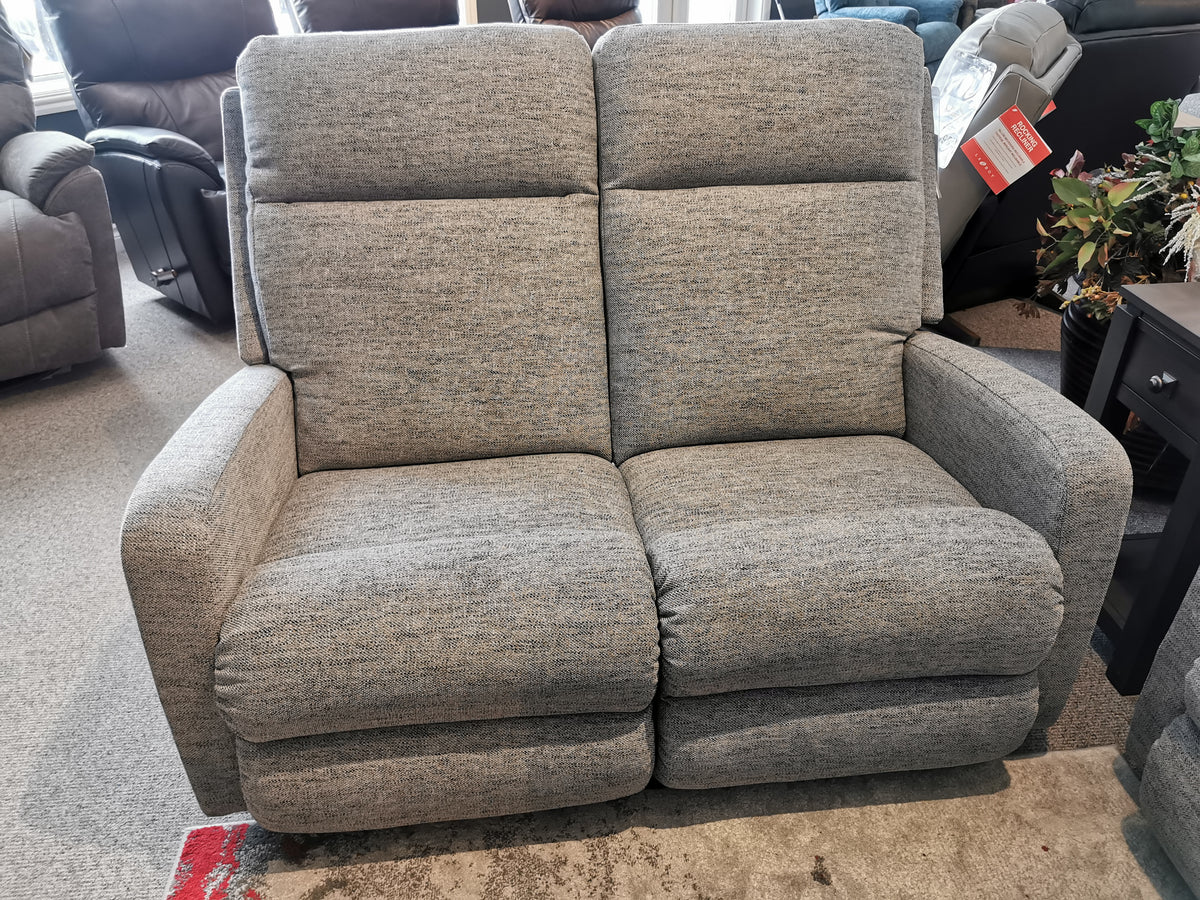 La-Z-Boy's 747 Finley gray loveseat with power recline showcased in a store.