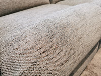 Close-up of the textured gray fabric on the La-Z-Boy 747 Finley Reclining Loveseat, showcasing detailed weave.