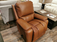 La-z-boy Greyson Rocker Recliner in a showroom on a wooden floor surrounded by various furniture pieces.