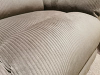 Close-up of a textured, ribbed fabric on the gray upholstery of the La-Z-Boy 761 Joel Reclining Loveseat cushion, showcasing its soft surface that's ideal for plush reclining chaise afternoons.