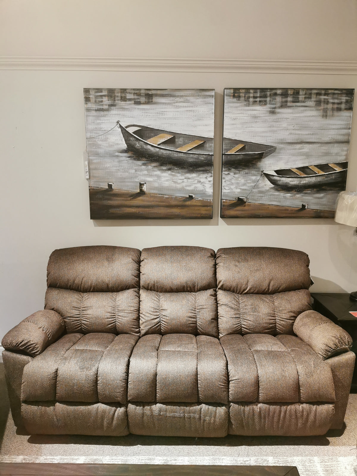 La-Z-Boy 766 Morrison Reclining Sofa in a living room, featuring plush cushioning and boat paintings on the wall.