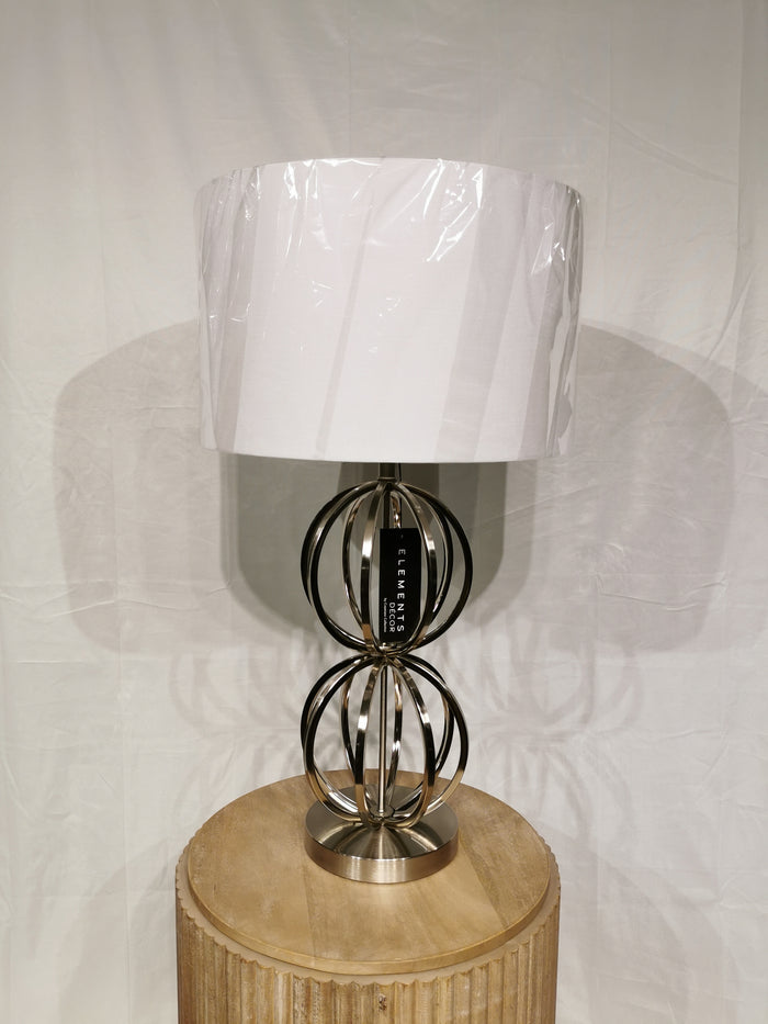 The Crestview Collection Metal 30" Table Lamp with a white shade is perfect for modern home decor.