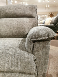 Close-up of the 706 Jay Loveseat by La-z-boy, featuring plush seats and padded armrests in a furniture showroom.