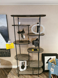 The Henderson Bookcase by Woodcraft: sleek black metal and wood design for modern sculptures and ample storage.