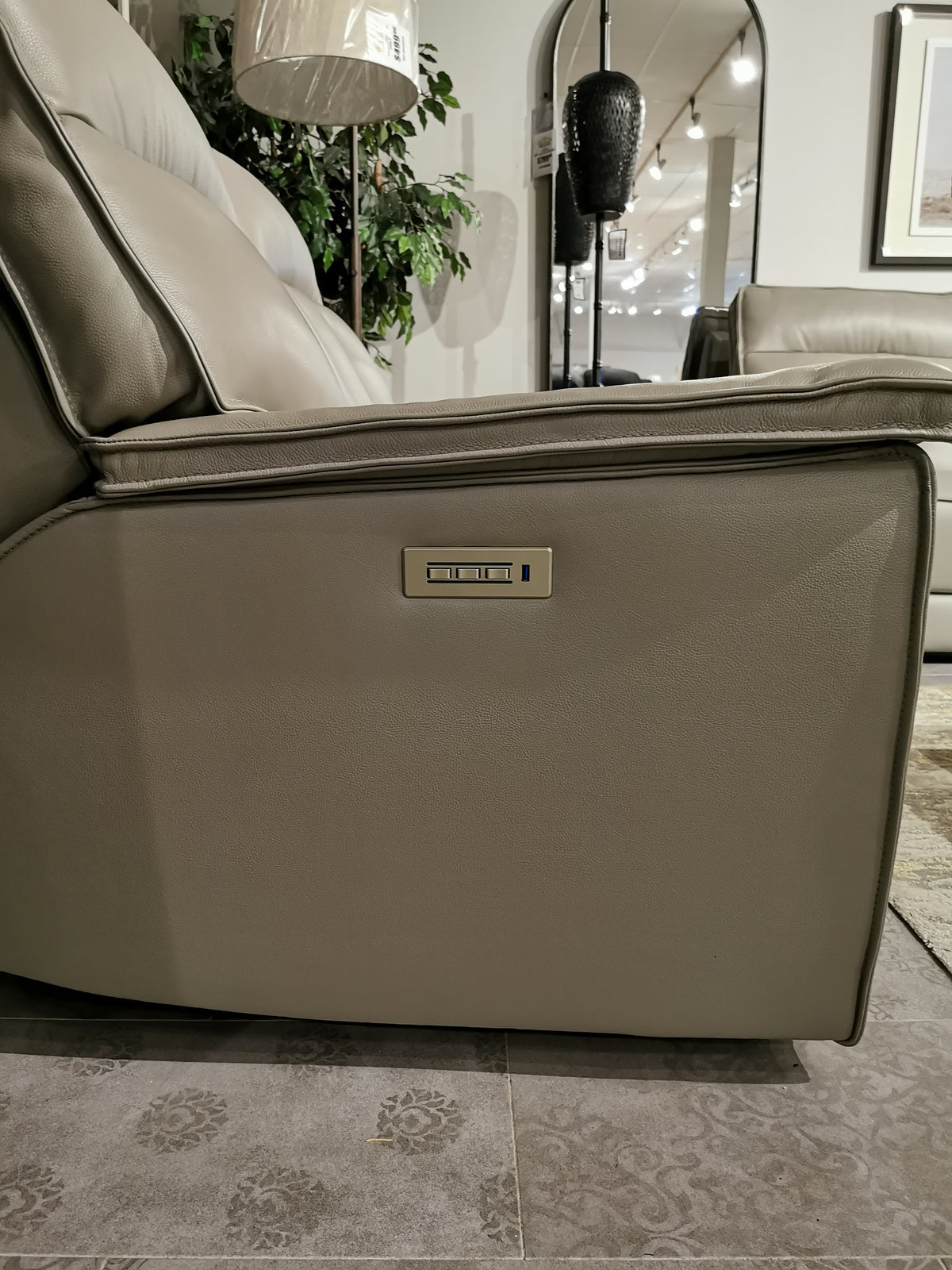 Side view of Palliser's Oakley Zero Gravity Power Loveseat in gray leather, featuring wall-hugger tech and control panel.