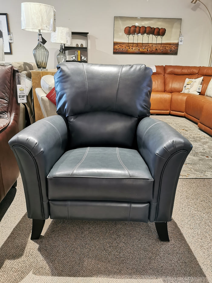 The Decor-rest 3450 Push Back Recliner with sinuous springs is surrounded by other chairs and a painting.