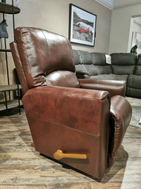 La-z-boy's 802 Cassian Rocker Recliner in brown leather with wooden lever, perfect for comfort in modern living spaces.