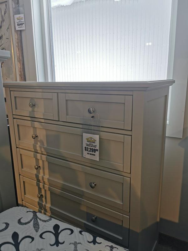 BB26115 Bonanza Grey 5 Drawer Chest by Vaughan Bassett, $2,299, placed next to a window.