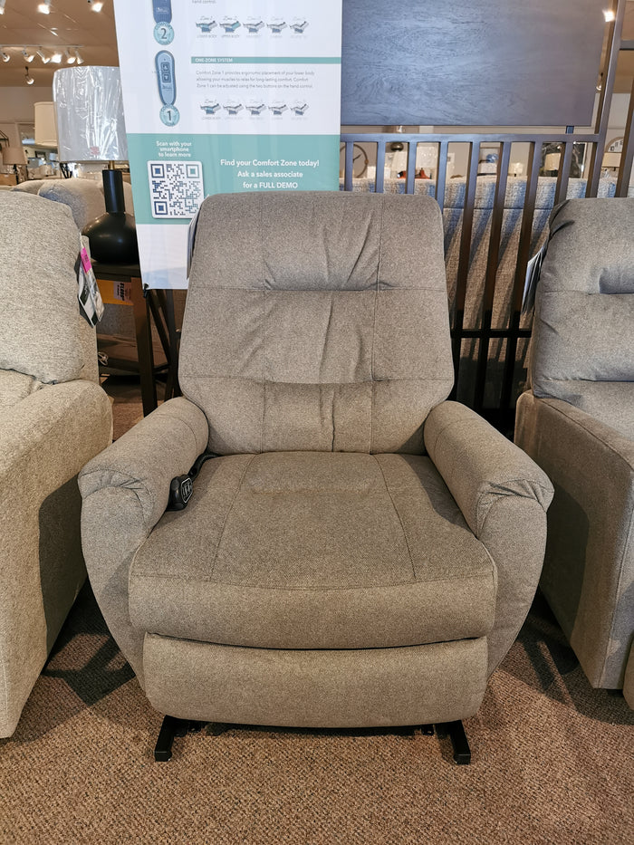 Best's Felicia Lift Chair in grey, with a Space Saver feature and armrest controls, shown under a showroom sign.