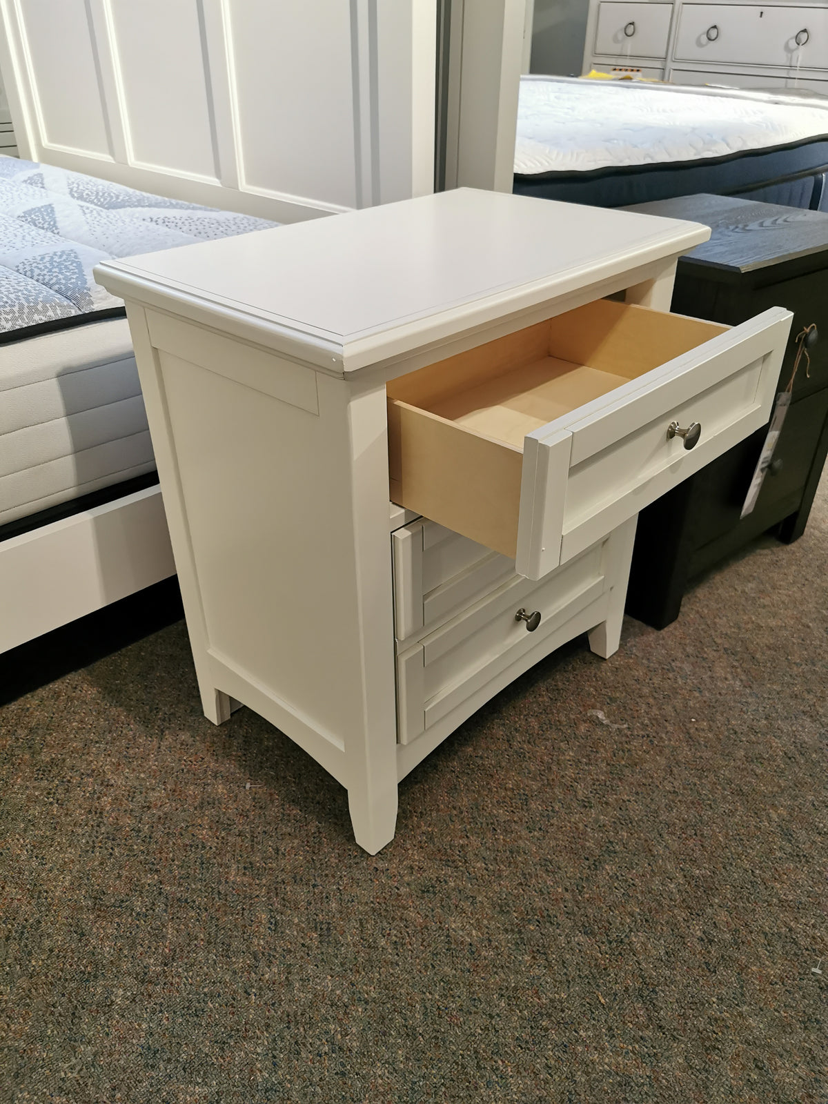 The BB29 Bonanza White Nightstand by Vaughan Bassett has a transitional style with three drawers and an open top.