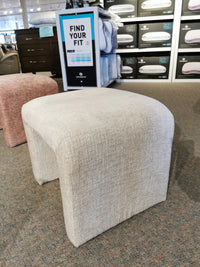 In-store display: Jofran's Sophia Petite Bench with waterfall sides, pillows, and a "Find Your Fit" sign in the background.