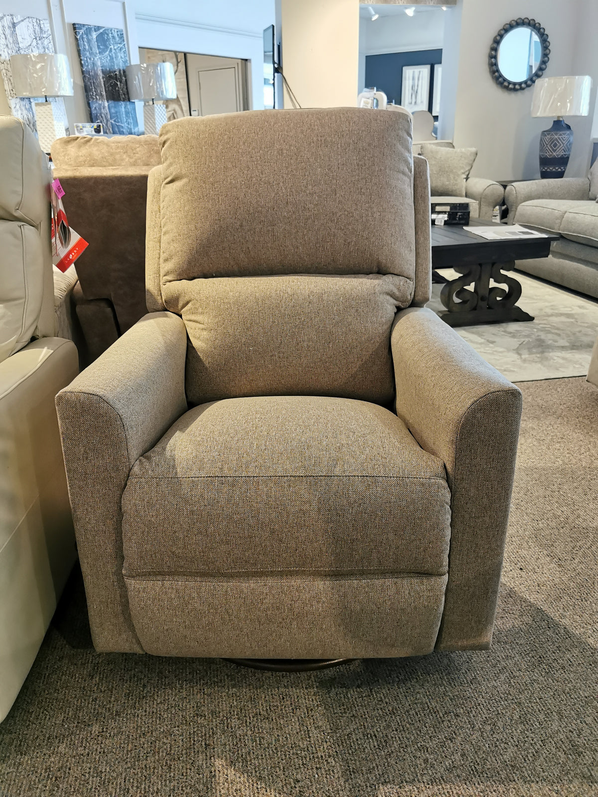 The La-Z-Boy 700 Wynne Swivel Glider in gray beautifully enhances any living space.