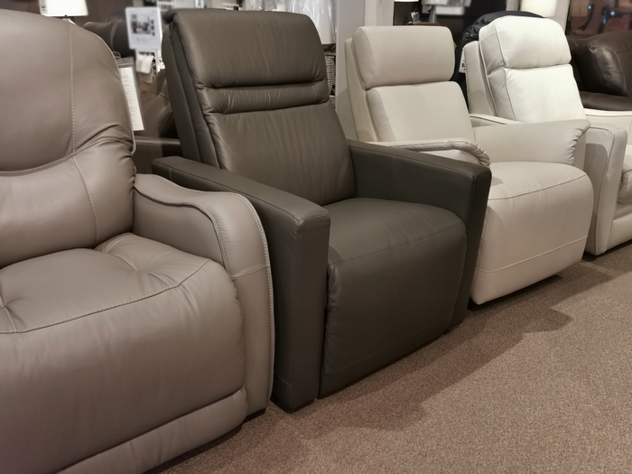 Palliser 42224 Highland 2 Bali Rainstorm - Ergonomic leather power recliners in beige, dark gray, and white on display.