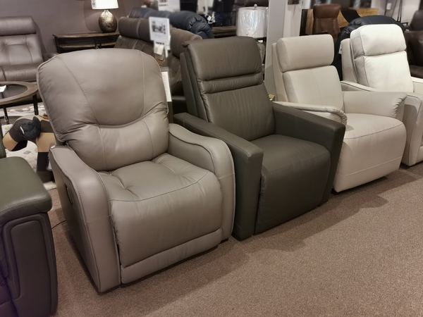 Row of Palliser 42224 Highland 2 Bali Rainstorm chairs in grey and beige showcasing ergonomic seating in a showroom.