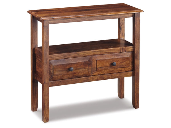 The Abbonto Accent Tables by Ashley are wooden consoles with two drawers and an open shelf, offering plenty of storage. With a natural finish and black knobs, they're ideal for adding stylish organization to any room.