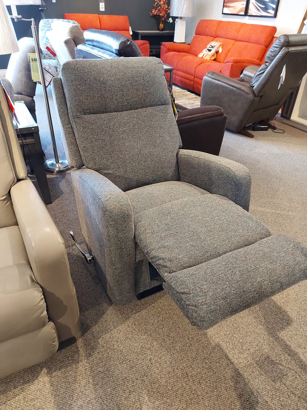 A contemporary-style recliner chair, the La-Z-Boy 747 Finley Wall-a-way Recliner, features sleek track arms, a gray upholstered ultra-plush chaise seat, and an extended footrest, available in a furniture store.