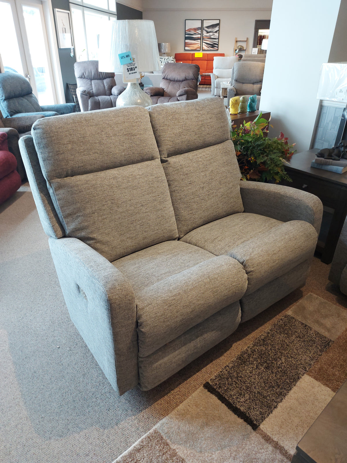 The La-Z-Boy 747 Finley Power Reclining Loveseat features modern lines and an ultra-plush chaise seat.