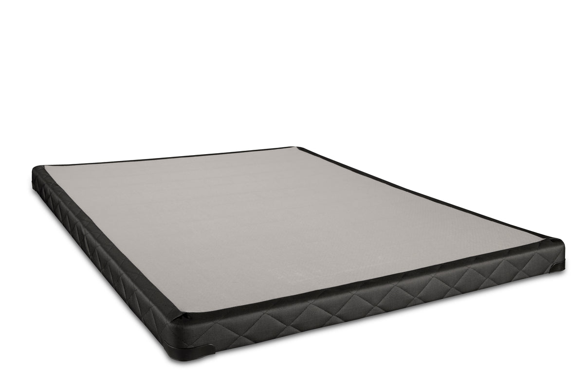 A black and gray platform bed base with a quilted pattern on the sides, viewed from a low angle, sits elegantly beneath its superior companion—the Sealy Classic Box-Spring.