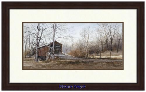 A framed painting titled "Kissin Bridge" by Picture Depot features a rustic wooden barn amidst bare trees and a dirt path under a cloudy sky, beautifully capturing a picturesque old country setting.