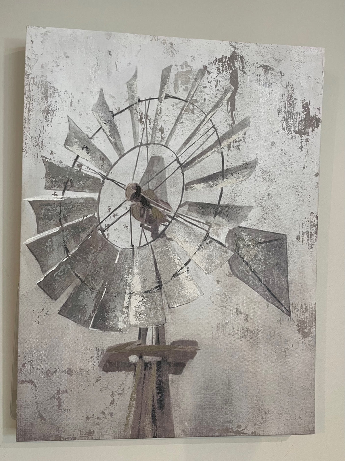 The Windmill Print by Giftcraft, featuring a rustic metal windmill with weathered blades set against a textured gray background, makes an exquisite decorative gift that is perfect for enhancing any home's aesthetic.