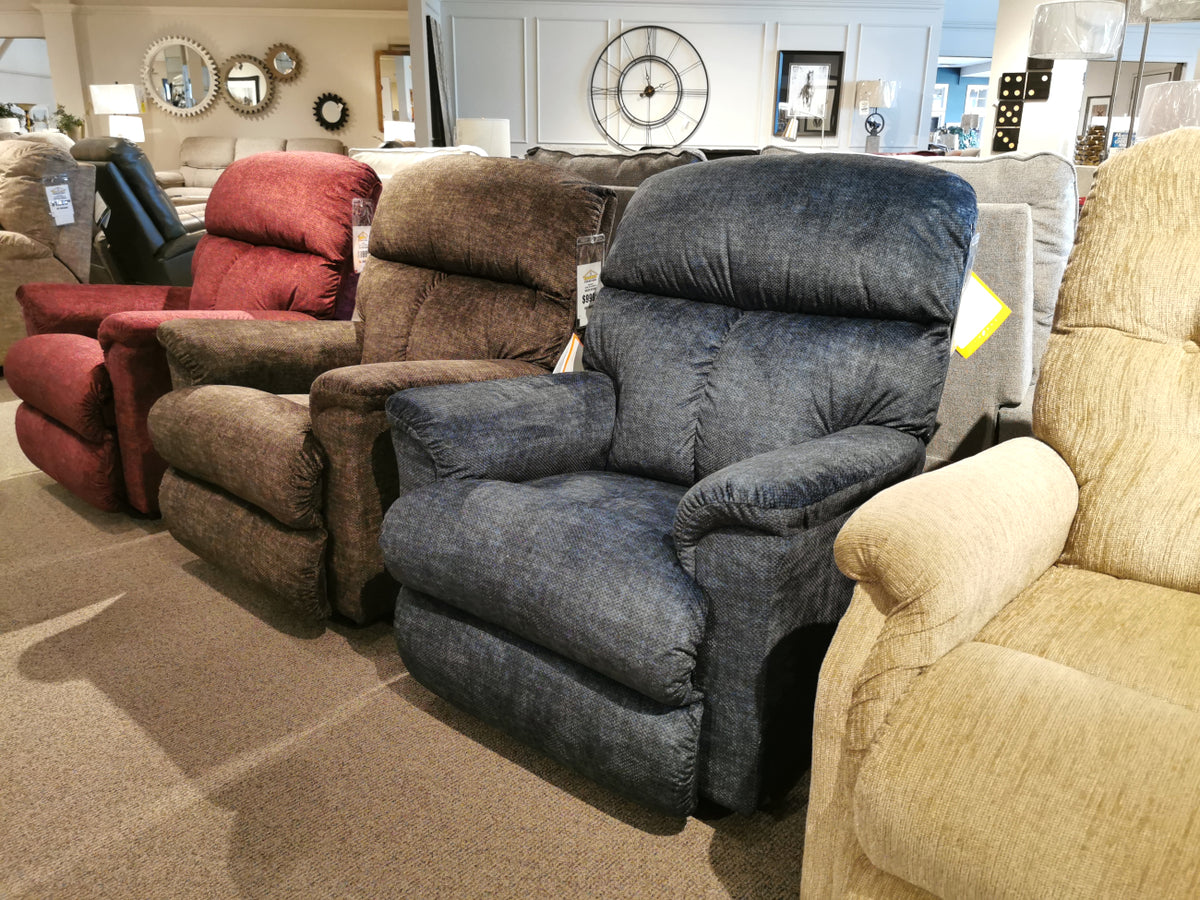 The showroom features La-Z-Boy 704 Reed Wall-A-Way Recliner chairs, offering ultra-plush comfort.