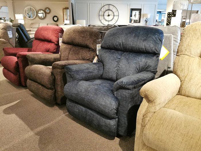 The showroom features La-Z-Boy 704 Reed Wall-A-Way Recliner chairs, offering ultra-plush comfort.