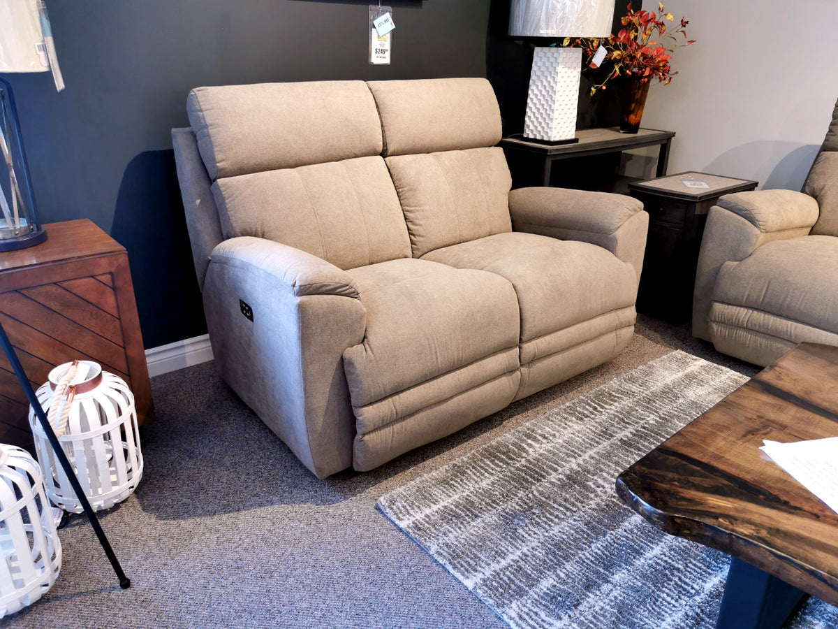 La-Z-Boy's 754 Talladega power reclining loveseat with USB, amidst modern decor: lamp, side table, and striped rug.