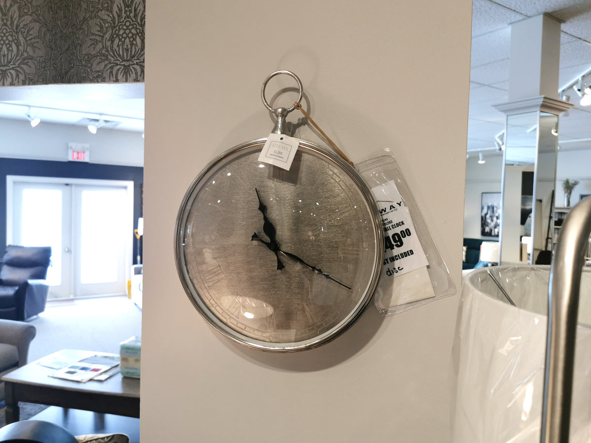 Introducing the Renwil CL203 Bryony Wall Clock, part of the stunning Bryony Collection. This elegant analog timepiece showcases a cracked glass face with traditional Roman numerals and is available for purchase at $49.00.