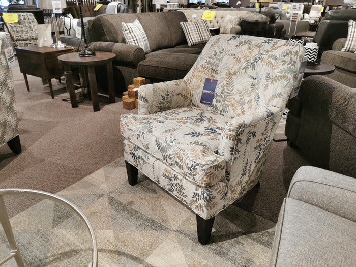 31 Chair - Fendi Sky by Superstyle on display in Toronto showroom with sofas, wooden tables, and carpeted floor.