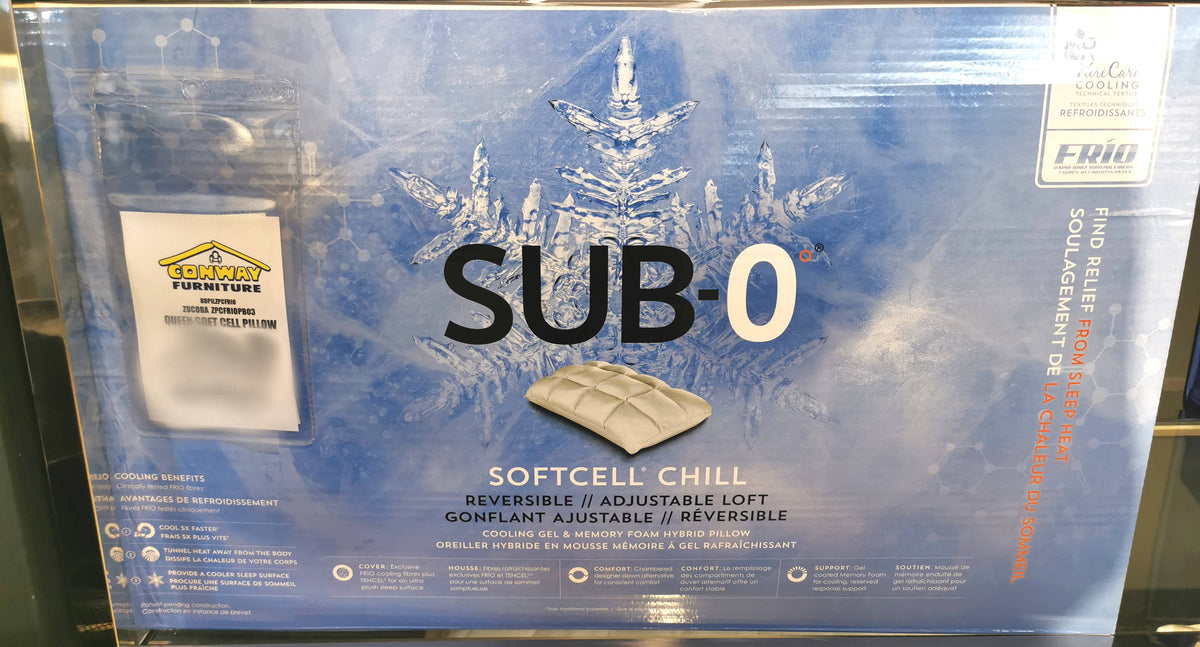 Box for "SUB-0 Hybrid Pillow" by Zucora Home, featuring cooling properties with memory foam and an elegant snowflake design, displayed in a store.